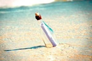 a message in a bottle on a beach