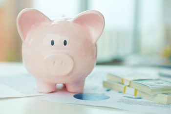 pink piggy bank on a table